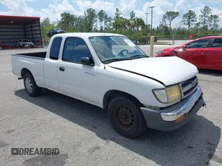 1999 Toyota Tacoma with VIN 4TAVL52N2XZ539983, listed as a IAAI auction lot 41804835 with 138,415 mi miles and . Bid and sale history available at DreamBid. Image 1.