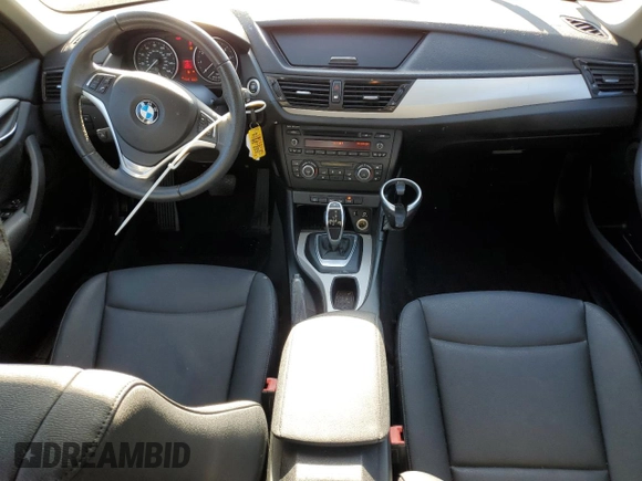2015 BMW X1 xDrive28i with VIN WBAVL1C5XFVY31850, listed as a Copart auction lot 77491614 with 112,442 mi miles and Clean Title. Bid and sale history available at carsss.com. Image 8.