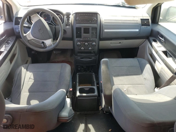 2009 Dodge Grand Caravan SE with VIN 2D8HN44E49R585395, listed as a Copart auction lot 52908795 with 304,111 mi miles and Salvage Title. Bid and sale history available at carsss.com. Image 8.