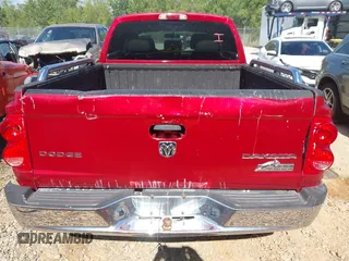 2009 Dodge Dakota SXT with VIN 1D7HE38K49S778966, listed as a IAAI auction lot 42034664 with 169,756 mi miles and . Bid and sale history available at carsss.com. Image 6.
