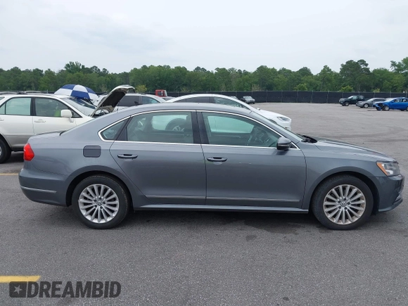 2016 Volkswagen Passat SE z VIN 1VWBT7A36GC007977, wystawiony jako IAAI lot #42433371 z przebiegiem 124 064 mil mil oraz . Historia ofert i sprzedaży dostępna na DreamBid. Obrazek 13.