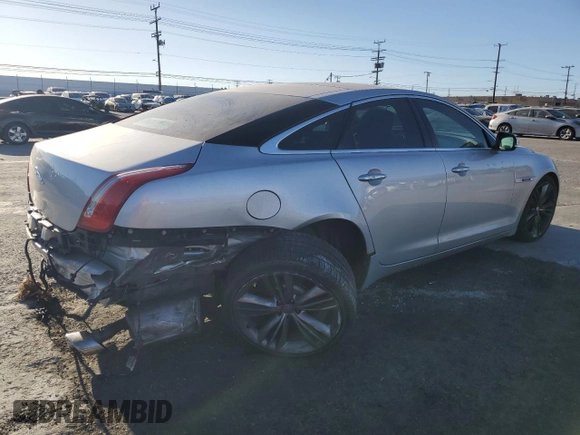 2011 Jaguar XJ with VIN SAJWA1JC0BMV13347, listed as a Copart auction lot 87699375 with Not Provided miles and Salvage Title. Bid and sale history available at DreamBid. Image 3.