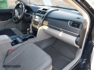 2014 Toyota Camry Hybrid LE with VIN 4T1BD1FK8EU113508, listed as a IAAI auction lot 42068470 with 386,932 mi miles. Bid and sale history available at carsss.com. Image 5.