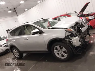 2014 Toyota RAV4 XLE with VIN JTMRFREV5ED052819, listed as a IAAI auction lot 42014672 with 235,481 mi miles and . Bid and sale history available at DreamBid. Image 14.