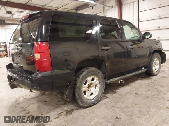 2013 Chevrolet Tahoe Commercial z VIN 1GNSK2E01DR331721, wystawiony jako IAAI lot #42093449 z przebiegiem 178 731 mil mil oraz . Historia ofert i sprzedaży dostępna na DreamBid. Obrazek 4.