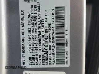2021 Honda Odyssey Touring z VIN 5FNRL6H85MB039444, wystawiony jako Copart lot #57142205 z przebiegiem 74 228 mil mil oraz Szkoda całkowita • Salvage title. Historia ofert i sprzedaży dostępna na DreamBid. Obrazek 13.