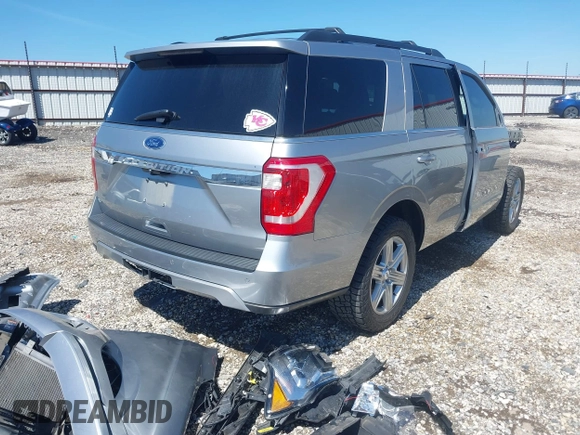 2021 Ford Expedition XLT z VIN 1FMJU1HT9MEA33614, wystawiony jako IAAI lot #42057547 z przebiegiem 72 168 mil mil oraz . Historia ofert i sprzedaży dostępna na DreamBid. Obrazek 4.