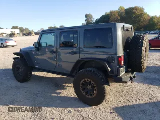 2013 Jeep Wrangler Unlimited Rubicon 10th Anniversary z VIN 1C4HJWFG0DL704100, wystawiony jako Copart lot #75573634 z przebiegiem 103 158 mil mil oraz Szkoda całkowita • Salvage title. Historia ofert i sprzedaży dostępna na DreamBid. Obrazek 2.