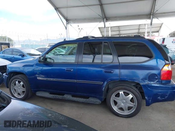 2006 GMC Envoy SLE with VIN 1GKDS13S562252049, listed as a IAAI auction lot 41940052 with 149,445 mi miles. Bid and sale history available at carsss.com. Image 15.
