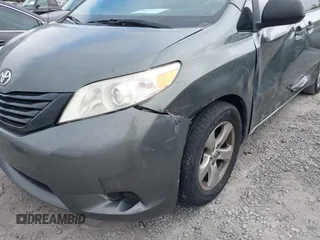 2014 Toyota Sienna L with VIN 5TDZK3DC6ES421278, listed as a IAAI auction lot 41178679 with 202,823 mi miles. Bid and sale history available at carsss.com. Image 19.