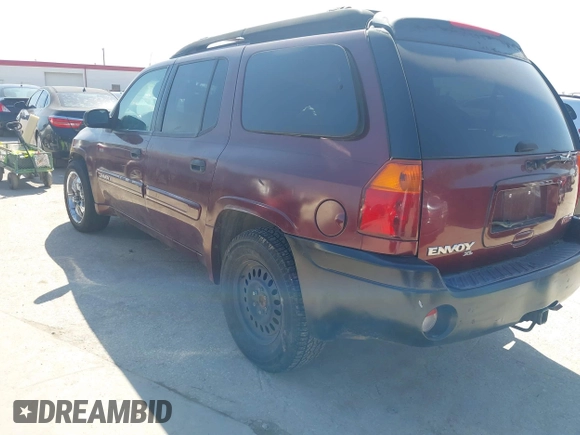 2003 GMC Envoy SLE with VIN 1GKES16S036238094, listed as a IAAI auction lot 41660209 with Not Provided miles and . Bid and sale history available at DreamBid. Image 3.