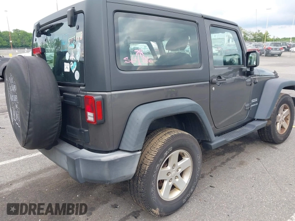 2016 Jeep Wrangler Willys Wheeler with VIN 1C4GJWAG2GL318981, listed as a IAAI auction lot 42390588 with 131,559 mi miles and . Bid and sale history available at DreamBid. Image 4.