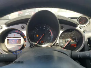 2010 Nissan 370Z z VIN JN1AZ4EH5AM500121, wystawiony jako Copart lot #58411355 z przebiegiem 146 943 mil mil oraz Tytuł czysty. Historia ofert i sprzedaży dostępna na DreamBid. Obrazek 9.