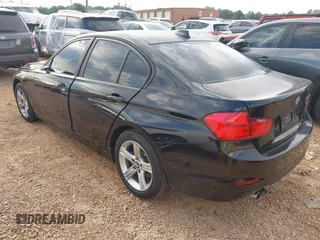 2014 BMW 3 Series 328i with VIN WBA3A5C56EF606175, listed as a IAAI auction lot 42211614 with 152,783 mi miles and . Bid and sale history available at DreamBid. Image 3.