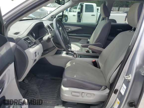 2018 Honda Pilot EX-L with VIN 5FNYF5H55JB020679, listed as a Copart auction lot 56469725 with 62,561 mi miles and Salvage title. Bid and sale history available at DreamBid. Image 7.