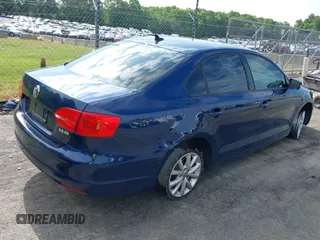 2012 Volkswagen Jetta SE with VIN 3VWDX7AJ1CM389470, listed as a IAAI auction lot 41011343 with 133,295 mi miles and . Bid and sale history available at DreamBid. Image 4.
