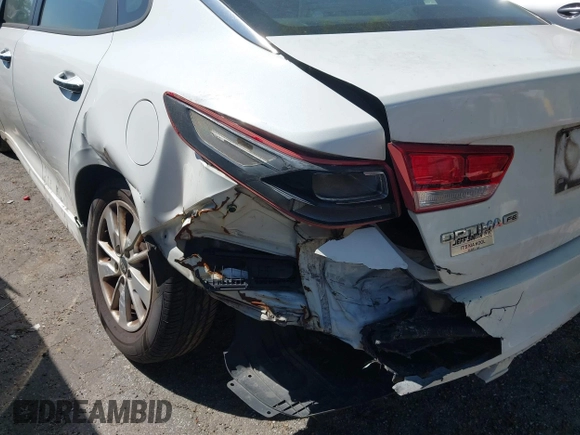 2017 Kia Optima LX with VIN 5XXGT4L32HG156781, listed as a IAAI auction lot 42044826 with 295,162 mi miles and . Bid and sale history available at carsss.com. Image 18.
