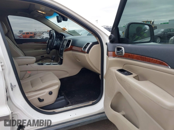 2012 Jeep Grand Cherokee Limited with VIN 1C4RJEBG4CC229571, listed as a IAAI auction lot 41565669 with 221,268 mi miles. Bid and sale history available at carsss.com. Image 5.