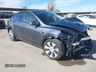 2023 Tesla Model Y Long Range with VIN 7SAYGDEE1PA060410, listed as a IAAI auction lot 41357943 with 19,072 mi miles. Bid and sale history available at carsss.com. Image 1.