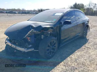 2022 Tesla Model X with VIN 7SAXCAE59NF346186, listed as a IAAI auction lot 41893923 with Not Provided miles and . Bid and sale history available at DreamBid. Image 2.