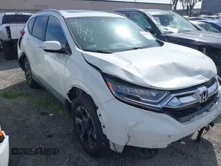 2017 Honda CR-V Touring with VIN 2HKRW1H96HH517669, listed as a IAAI auction lot 41653040 with 97,961 mi miles. Bid and sale history available at carsss.com. Image 1.