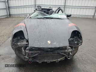 1999 Porsche 911 z VIN WP0CA2990XS651649, wystawiony jako Copart lot #45002045 z przebiegiem Nie podano mil oraz Szkoda całkowita • Salvage title. Historia ofert i sprzedaży dostępna na DreamBid. Obrazek 5.