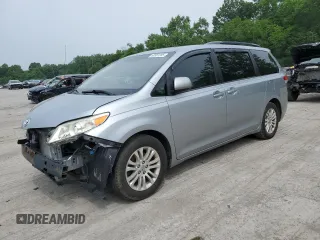 2014 Toyota Sienna XLE with VIN 5TDYK3DC3ES522452, listed as a Copart auction lot 60961205 with 477,570 mi miles and Salvage title. Bid and sale history available at DreamBid. Image 1.