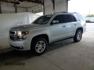 2020 Chevrolet Tahoe LT with VIN 1GNSKBKC5LR275814, listed as a Copart auction lot 60717355 with 92,765 mi miles and Salvage title. Bid and sale history available at DreamBid. Image 1.