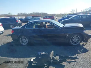 2014 BMW 4 Series 428i with VIN WBA3V7C59EJ872576, listed as a IAAI auction lot 41997699 with Not provided miles and . Bid and sale history available at DreamBid. Image 14.