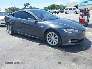 2016 Tesla Model S 70 with VIN 5YJSA1E16GF156312, listed as a IAAI auction lot 42469451 with 90,317 mi miles and . Bid and sale history available at DreamBid. Image 1.