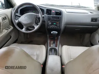 2002 Infiniti G20 Luxury z VIN JNKCP11AX2T500141, wystawiony jako Copart lot #70648434 z przebiegiem 196 559 mil mil oraz Szkody całkowita. Historia ofert i sprzedaży dostępna na DreamBid. Obrazek 8.