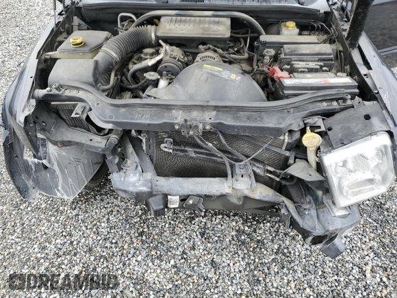 2006 Jeep Commander z VIN 1J8HH48K86C289122, wystawiony jako Copart lot #55810935 z przebiegiem 140 063 mil mil oraz Szkoda całkowita • Salvage title. Historia ofert i sprzedaży dostępna na DreamBid. Obrazek 12.
