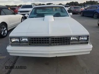 1984 Chevrolet El Camino z VIN 1GCCW80H6ER150486, wystawiony jako Copart lot #76031834 z przebiegiem 77 554 mil mil oraz Szkoda całkowita • Salvage title. Historia ofert i sprzedaży dostępna na DreamBid. Obrazek 5.