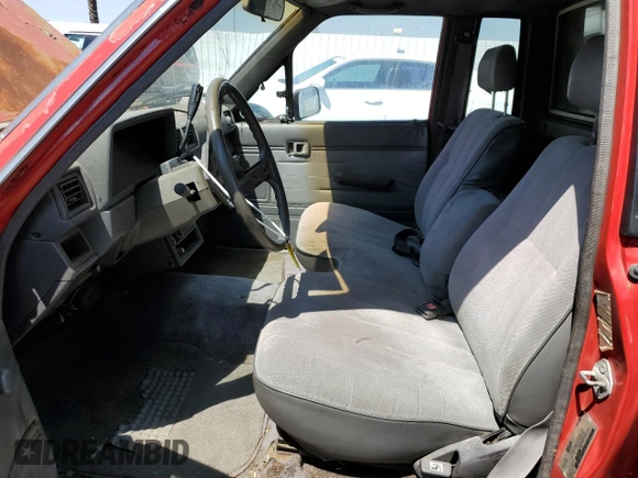 1987 Toyota Pickup с VIN JT4RN70D2H0048566, выставлен на аукционе Copart как лот 52362085 с пробегом 252 452 миль миль и Чистый • Clean title. История ставок и продаж доступна на DreamBid. Изображение 7.