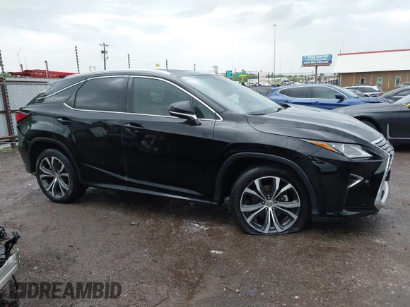 2016 Lexus RX 350 z VIN 2T2ZZMCA6GC005692, wystawiony jako IAAI lot #42147337 z przebiegiem 132 363 mil mil oraz . Historia ofert i sprzedaży dostępna na DreamBid. Obrazek 13.