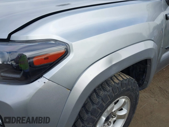 2023 Toyota Tacoma SR z VIN 3TMCZ5AN0PM538974, wystawiony jako IAAI lot #42510020 z przebiegiem 31 281 mil mil oraz . Historia ofert i sprzedaży dostępna na DreamBid. Obrazek 18.