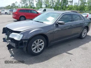 2015 Chrysler 300 Limited with VIN 2C3CCAAG1FH887073, listed as a IAAI auction lot 41967713 with 255,638 mi miles. Bid and sale history available at carsss.com. Image 2.