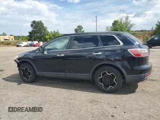 2012 Mazda CX-9 Grand Touring z VIN JM3TB2DAXC0358272, wystawiony jako Copart lot #60703665 z przebiegiem 278 558 mil mil oraz Szkoda całkowita • Salvage title. Historia ofert i sprzedaży dostępna na DreamBid. Obrazek 2.