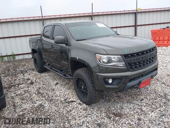 2018 Chevrolet Colorado 4WD LT z VIN 1GCGTCEN2J1235085, wystawiony jako IAAI lot #42192629 z przebiegiem 83 914 mil mil oraz . Historia ofert i sprzedaży dostępna na DreamBid. Obrazek 1.