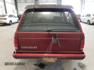 1990 Chevrolet Blazer z VIN 1GNCT18Z3L0102885, wystawiony jako Copart lot #89399875 z przebiegiem 176 063 mil mil oraz Szkoda całkowita • Salvage title. Historia ofert i sprzedaży dostępna na DreamBid. Obrazek 6.