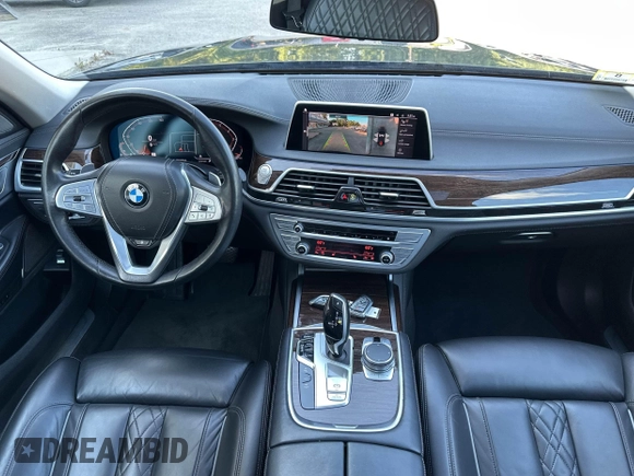 2022 BMW 7 Series 740i xDrive with VIN WBA7T4C06NCK78073, listed as a IAAI auction lot 42783922 with 104,432 mi miles and . Bid and sale history available at DreamBid. Image 6.