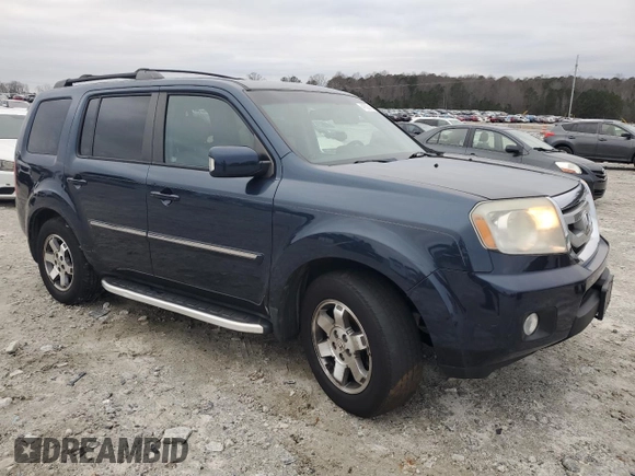 2011 Honda Pilot Touring with VIN 5FNYF4H96BB077391, listed as a Copart auction lot 41520315 with 196,291 mi miles and Salvage Title. Bid and sale history available at DreamBid. Image 4.