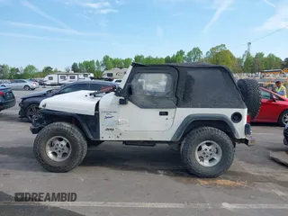 1998 Jeep Wrangler Sport with VIN 1J4FY19S5WP788331, listed as a IAAI auction lot 42027717 with 201,119 mi miles and . Bid and sale history available at DreamBid. Image 14.