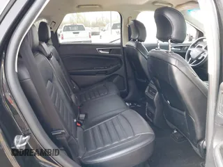 2015 Ford Edge SEL with VIN 2FMTK4J88FBB05259, listed as a IAAI auction lot 42043247 with 128,987 mi miles. Bid and sale history available at carsss.com. Image 8.