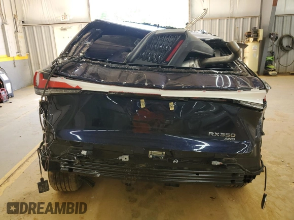 2023 Lexus RX 350 z VIN 2T2BAMCA8PC033728, wystawiony jako Copart lot #52756875 z przebiegiem Nie podano mil oraz Szkoda całkowita • Salvage title. Historia ofert i sprzedaży dostępna na DreamBid. Obrazek 6.