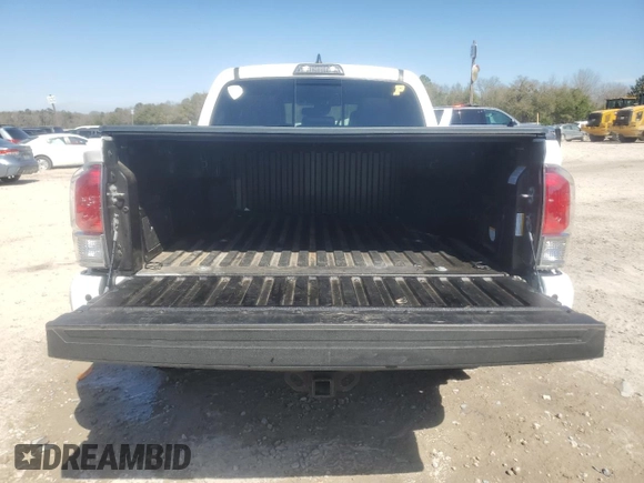 2018 Toyota Tacoma SR with VIN 3TMGZ5AN6JM127989, listed as a Copart auction lot 47944125 with 64,214 mi miles and Salvage Title. Bid and sale history available at carsss.com. Image 6.