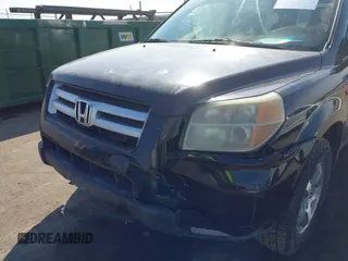 2006 Honda Pilot EX-L with VIN 5FNYF18766B008879, listed as a IAAI auction lot 41797763 with 398,242 mi miles and . Bid and sale history available at DreamBid. Image 6.