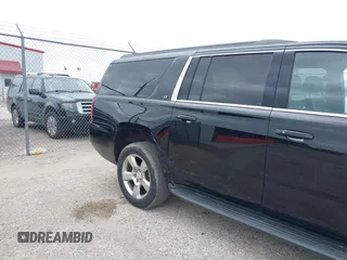 2016 Chevrolet Suburban LT with VIN 1GNSKHKC4GR233059, listed as a IAAI auction lot 42137869 with 115,571 mi miles. Bid and sale history available at carsss.com. Image 6.