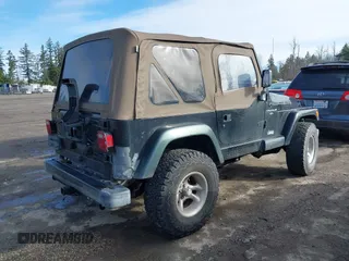 1999 Jeep Wrangler Sahara with VIN 1J4FY49S9XP410760, listed as a IAAI auction lot 41647187 with 181,353 mi miles. Bid and sale history available at carsss.com. Image 4.