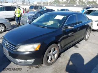 2015 Volkswagen Passat 1.8T S with VIN 1VWAT7A38FC078348, listed as a IAAI auction lot 41847952 with 135,530 mi miles. Bid and sale history available at carsss.com. Image 2.